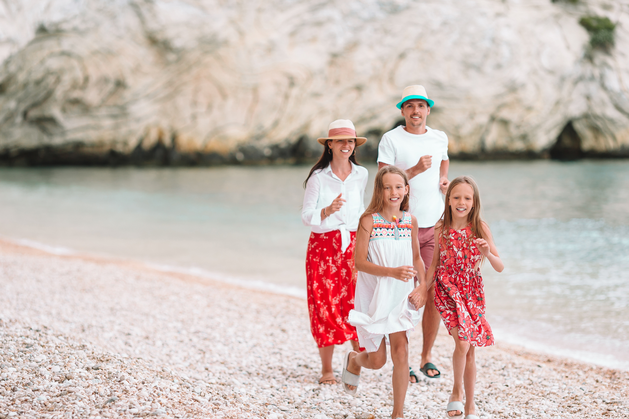 Beautiful happy family in mountains in the background of fog - Tennis Destination