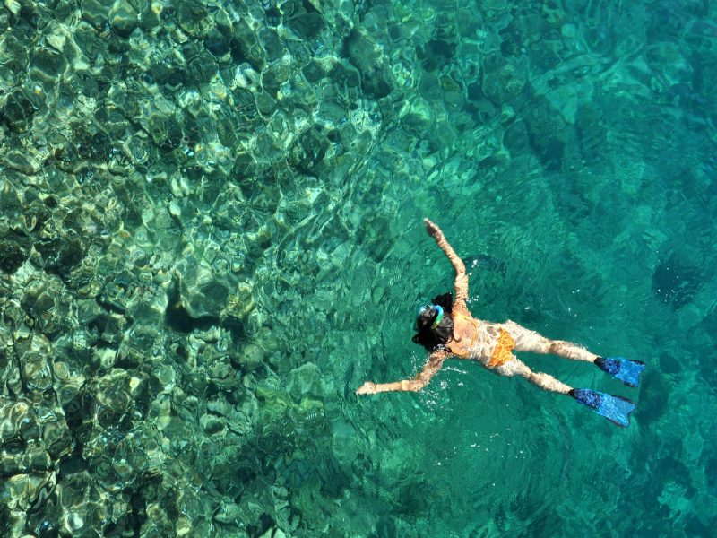 Woman snorkeling at Phi Phi Island, Phuket, Thailand